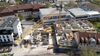 Hochwertige Dachgeschoßwohnung in generalsaniertem Altbau mit Blick über Linz!