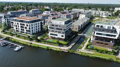 Exklusive 2-Zimmer-Wohnung mit unverbautem Wasserblick und Garten