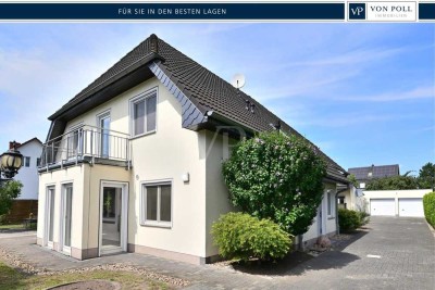 Ideales Zweifamilienhaus mit Pool und Doppelgarage in perfekter Lage!