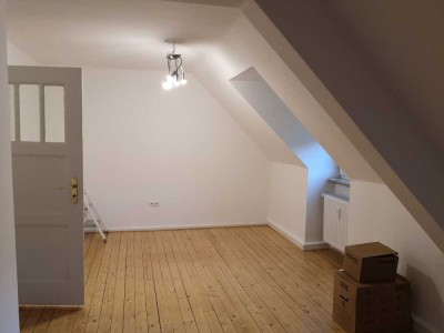 Attraktive Dachgeschosswohnung mit Tageslichtbad