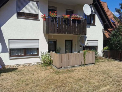 Schicke Zwei-Zimmer-Wohnung im Erdgeschoß mit Terrasse, Tiefgarage und Stellplatz