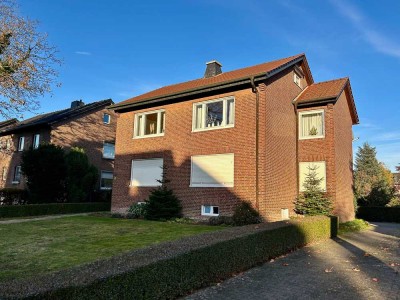 Attraktives Zweifamilienhaus inklusive Baugrundstück in zentraler Lage