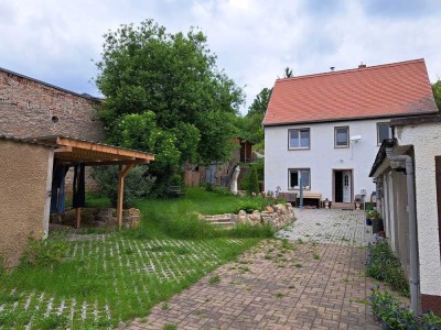 Einfamiliehaus mit Garten in Hanglage