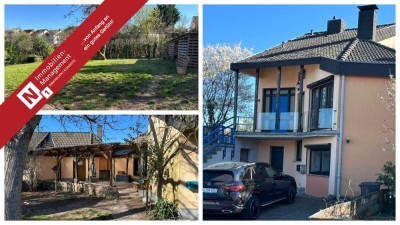 Freistehendes 2-3-Familienhaus mit großem Grundstück