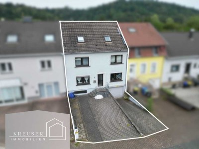 Zuhause mit Weitblick: Zweifamilienhaus auf großem Grundstück