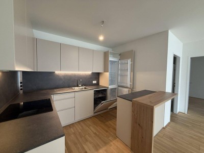Neubau Erstbezug I Nähe Donau I Fußbodenheizung I Balkon I Maßküche I Tiefgarage I Fernwärme I