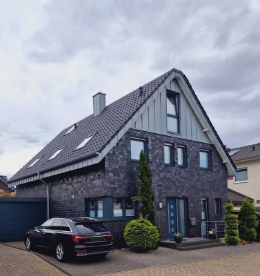Familienfreundliches freistehendes Einfamilienhaus mit Garten in Jüchen