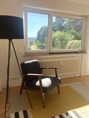 Möblierte 1-Zimmer-Wohnung mit großzügiger Terrasse & Gartenblick in Tübingens Bestlage