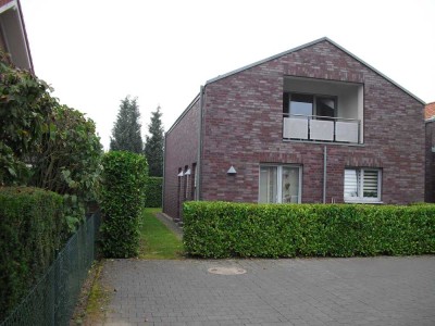 Erdgeschosswohnung mit Terrasse und offenem Kamin