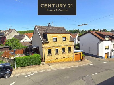 Gemütliches freistehendes Einfamilienhaus mit Terrasse, Garten und Garage in Dudweiler