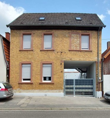 Freundliche 2,5-Zimmer-EG-Wohnung mit Einbauküche in Alsheim, Erstbezug nach Kernsanierung