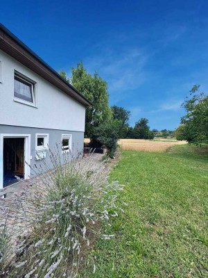 Einfamilienhaus in Feldrandlage – sanierungsbedürftig mit Entwicklungspotenzial