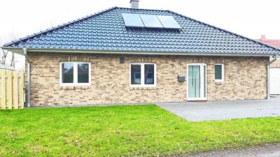 Zentrum! Junger Bungalow, KfW 55 Energie mit Garage, Kaminofen, EBK. Pflegeleichtes Grundstück…