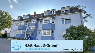 Gepflegtes Mehrfamilienhaus mit 7 WE, Balkonen, Terrasse + Garagen in Wolfartsweier