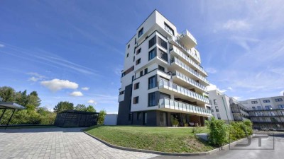 Hochwertige 2021 gebaute 3-Zimmer-Wohnung mit Balkon und TG-Stellplätzen in zentraler Lage!