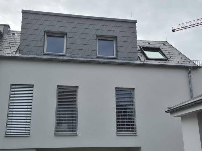 Dachgeschoss Wohnung mit Terrasse und Stellplatz, vermietet bis Juni 2026