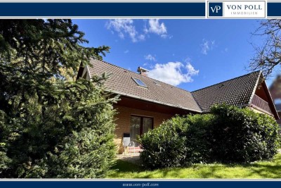 Großzügiges Familienhaus mit Einliegerwohnung und herrlichem Garten in exzellenter Lage