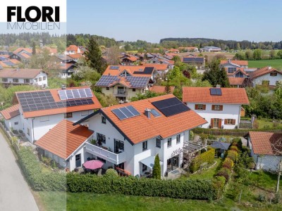 Wohnen, wo andere Urlaub machen – Dreifamilienhaus mit Seeblick