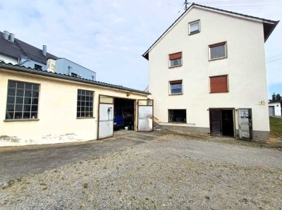 Zentrales Mehrfamilienhaus mit großem Grundstück