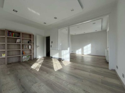 Geräumige Maisonette-Wohnung mit zwei Balkonen und Garage!