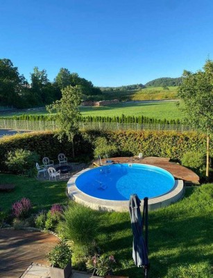 Moderne großzügige DHH, KNX, PV Anlage und wunderschöner Garten mit Pool