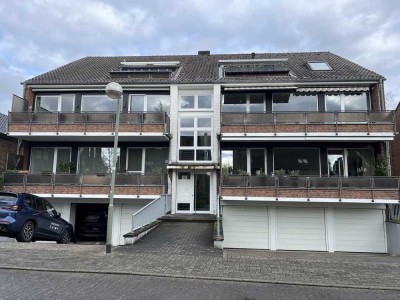 Freundliche und modernisierte 3-Zimmer-Wohnung mit zwei Balkon und direkten Gartenzugangin Meerbusch