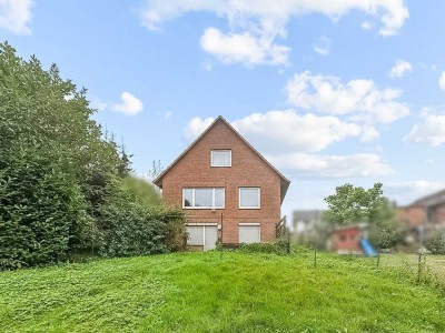 Zwei zum Preis von einem: Wohnen und Vermieten auf großem Grundstück in gesuchter Lage von Reinfeld