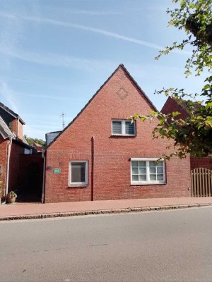 Einfamilienhaus mit Einliegerwohnung in Oldenswort zu verkaufen