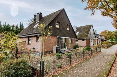 Traumhaftes Einfamilienhaus mit Kamin und Gartenidylle