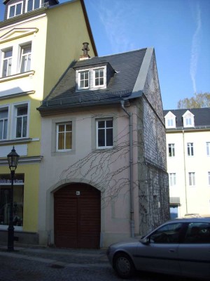 Kleines Torbogenhaus mit 2 - Raum-Wohnung