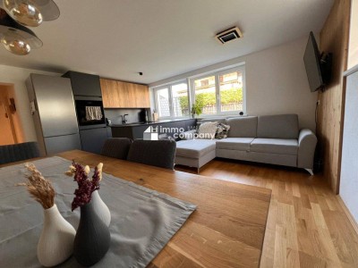 AXAMS : NEUWERTIGE, SEHR RUHIG GELEGENE 3-ZIMMER GARTENWOHNUNG