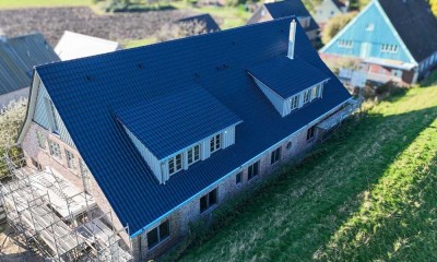 Neubauwohnung mit 134m² Gesamtfläche am Deich in Moorrege – Wohnen mit Blick auf die Pinnau