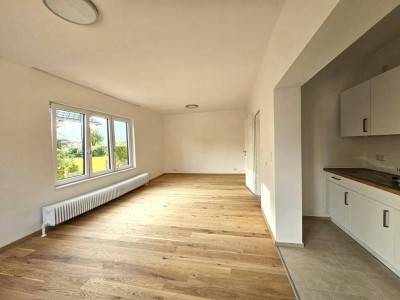 Top sanierte 3-Zimmer-Wohnung mit neuer Küche und Garage!