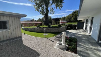 Gartenwohnung mit grandiosem Bergblick und smartem Hauskonzept