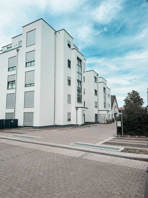 Moderne 2-ZKB Wohnung mit Gartenanteil und Tiefgarage