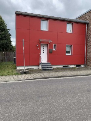 Schmuckes Einfamilienhaus in der Stadtmitte von Linnich mit parkähnlichem Grundstück