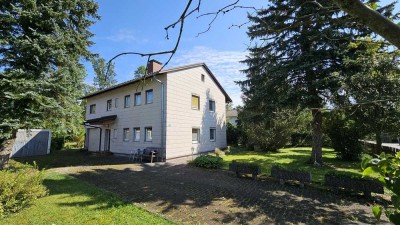 Zweifamilienhaus mit großem Grundstück und zusätzlichem Baurecht in Bruckmühl