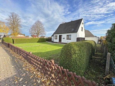 Heidekamp - renovierungsbedürftiges Einfamilienhaus/ Baugrundstück mit Teilkeller in charmanter Wohn