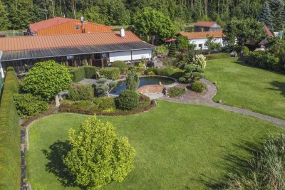 Direkt am See: Gepflegtes 4-Zi.-Zuhause mit einzigartigem Grundstück, Bootssteg und Einliegerwhg.