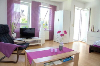 Gepflegte 1,5-Zimmer-Terrassenwohnung mit Balkon und Einbauküche in Eschbach