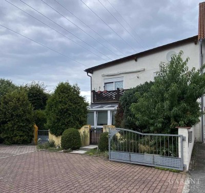 Einfamilienhaus inklusive ehemaliger Gewerbeeinheit mit vielseitigen Nutzungsmöglichkeiten