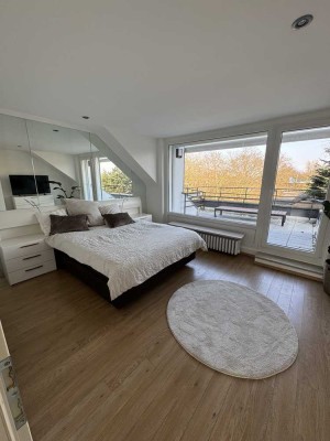 Möbilierte Dachgeschosswohnung mit 2 Terrassen
