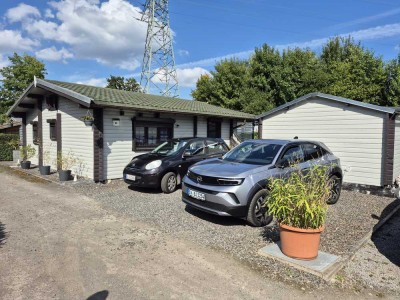 Gemütliches 3,5 Zimmer Holzblockhaus mit Wintergarten & Nebengebäude mit 77 m²