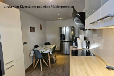 Attraktive 4-Zimmer-Wohnung mit großzügigem Balkon, Gartenmitnutzung und Garagen