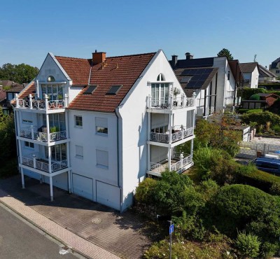 Niedernhausen: Eine schöne 3-Zimmerwohnung mit Balkon, Garten und 2 Stellplätzen!