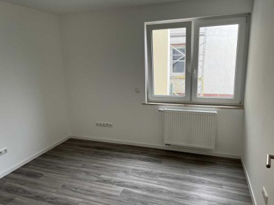 Neuwertige 4-Raum-Wohnung mit Einbauküche, Terrasse und großem Garten in Bitburg