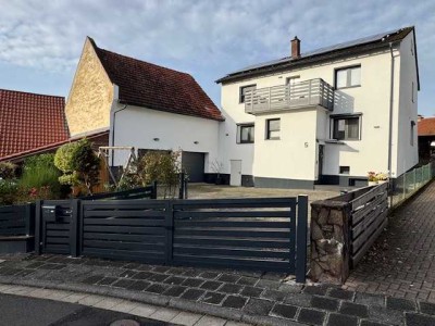 Einfamilienhaus mit 2 Garagen, PV-Anlage, Pool, Garten u.v.m. in 63549 Ronneburg-Hüttengesäß