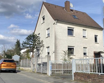 Sanierungsbedürftiges 2-Familienhaus in Langen mit viel Potenzial