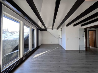 Helle Dachgeschosswohnung mit Charme über den Dächern der Stadt