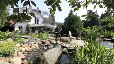 ***Haus mit zwei Wohneinheiten, großem Garten, Teich und vielen Extras***